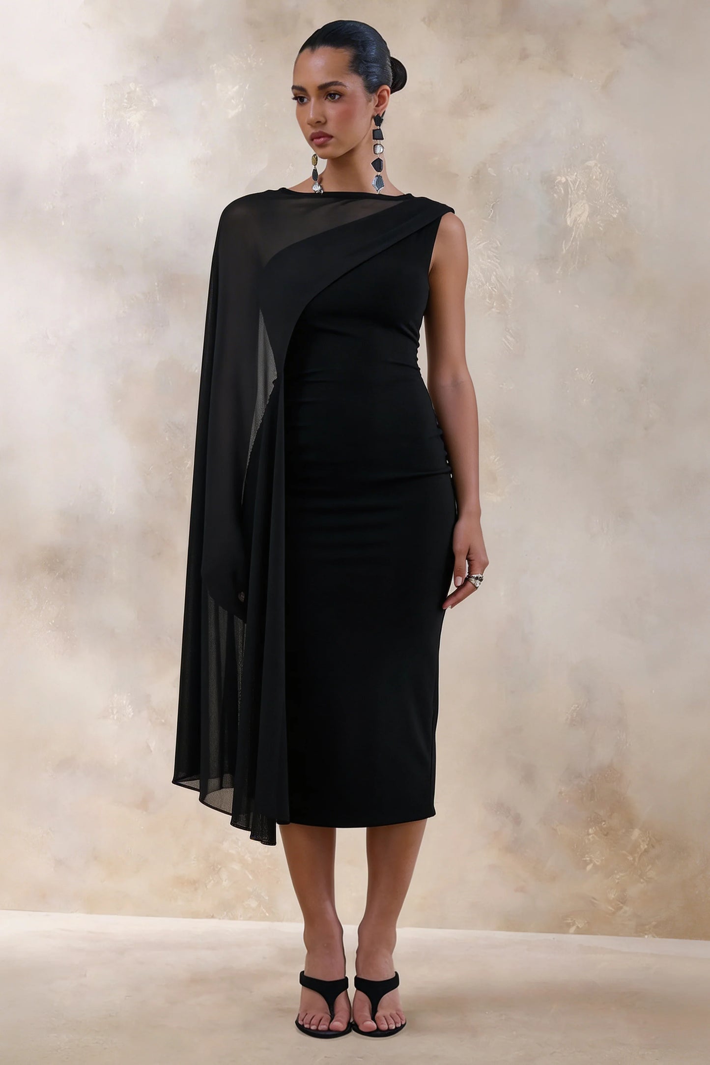 Caloria Black Asymmetric Neck Midi Dress With Mesh Cape