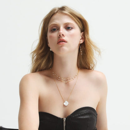 Pearl Waterfall Huggie Earrings