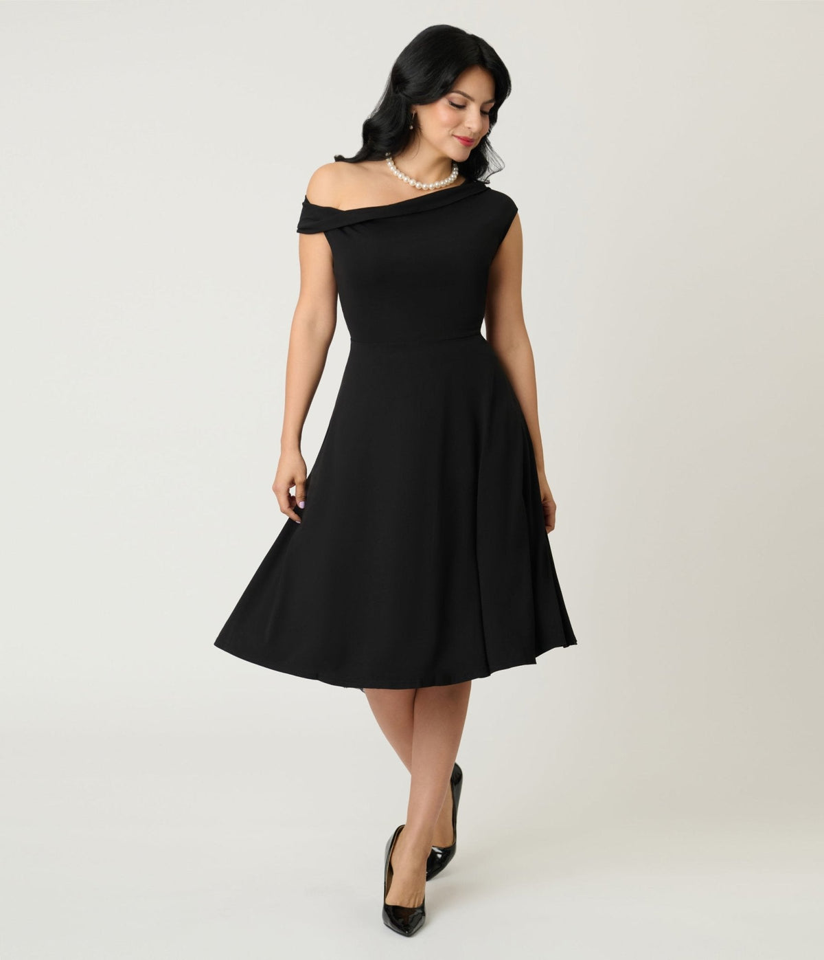 Unique Vintage Black Asymmetrical Neck Swing Dress